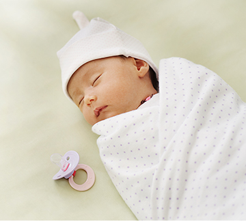 Dziecko nie chce spać w łóżeczku – jak je do tego przekonać?